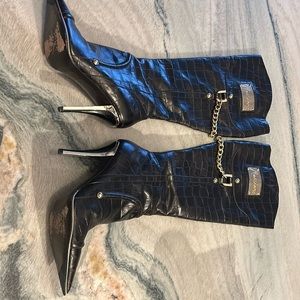 Size 7.5 black leather with gold accents